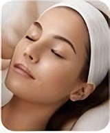 Woman relaxing during a facial